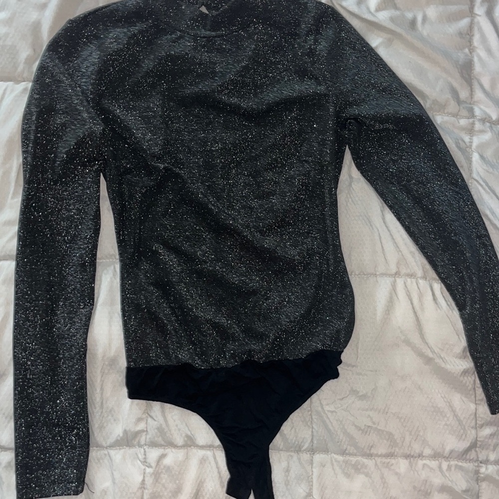 Woman’s small glitter turtleneck